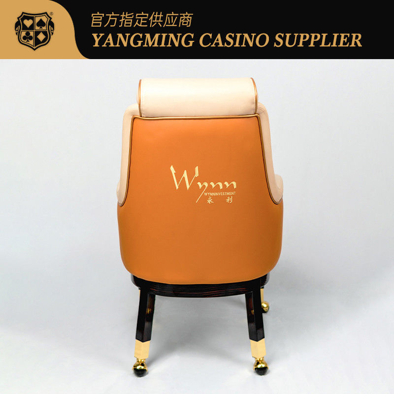 Calidad Confortable de cuero y madera Wynn Macao modelo personalizado del jugador silla Casino Baccarat con ruedas silla de póquer fábrica