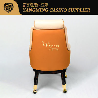 Calidad Confortable de cuero y madera Wynn Macao modelo personalizado del jugador silla Casino Baccarat con ruedas silla de póquer fábrica